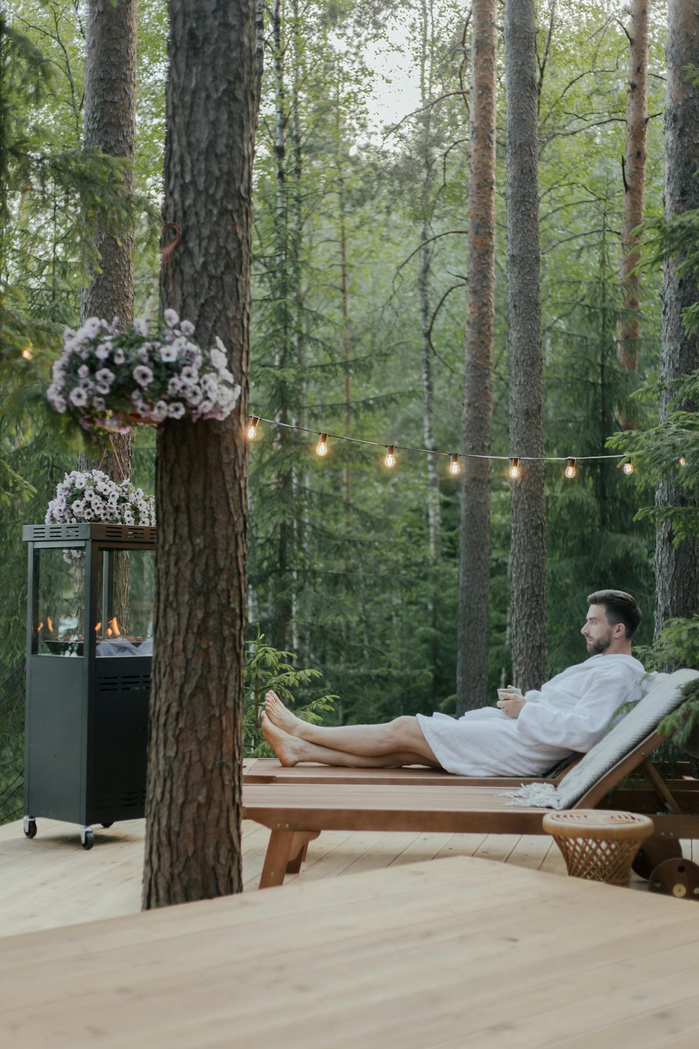 Summer Stories from Mint Retreat Suites 1 a man in a bathrobe enjoys a